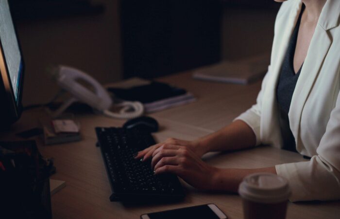 Woman working late at her office desk